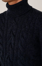 Dolcevita in lana a trecce