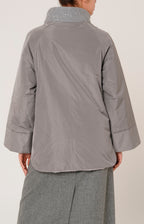 Piumino over in tessuto tecnico, lana e cashmere