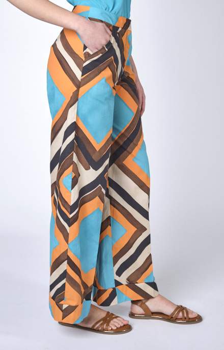 Pantalone gamba larga con fantasia geometrica