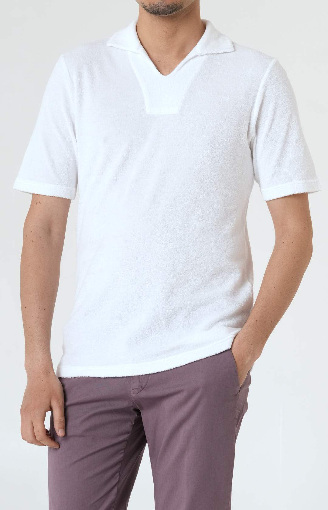 Short-sleeved terry polo shirt with open neck