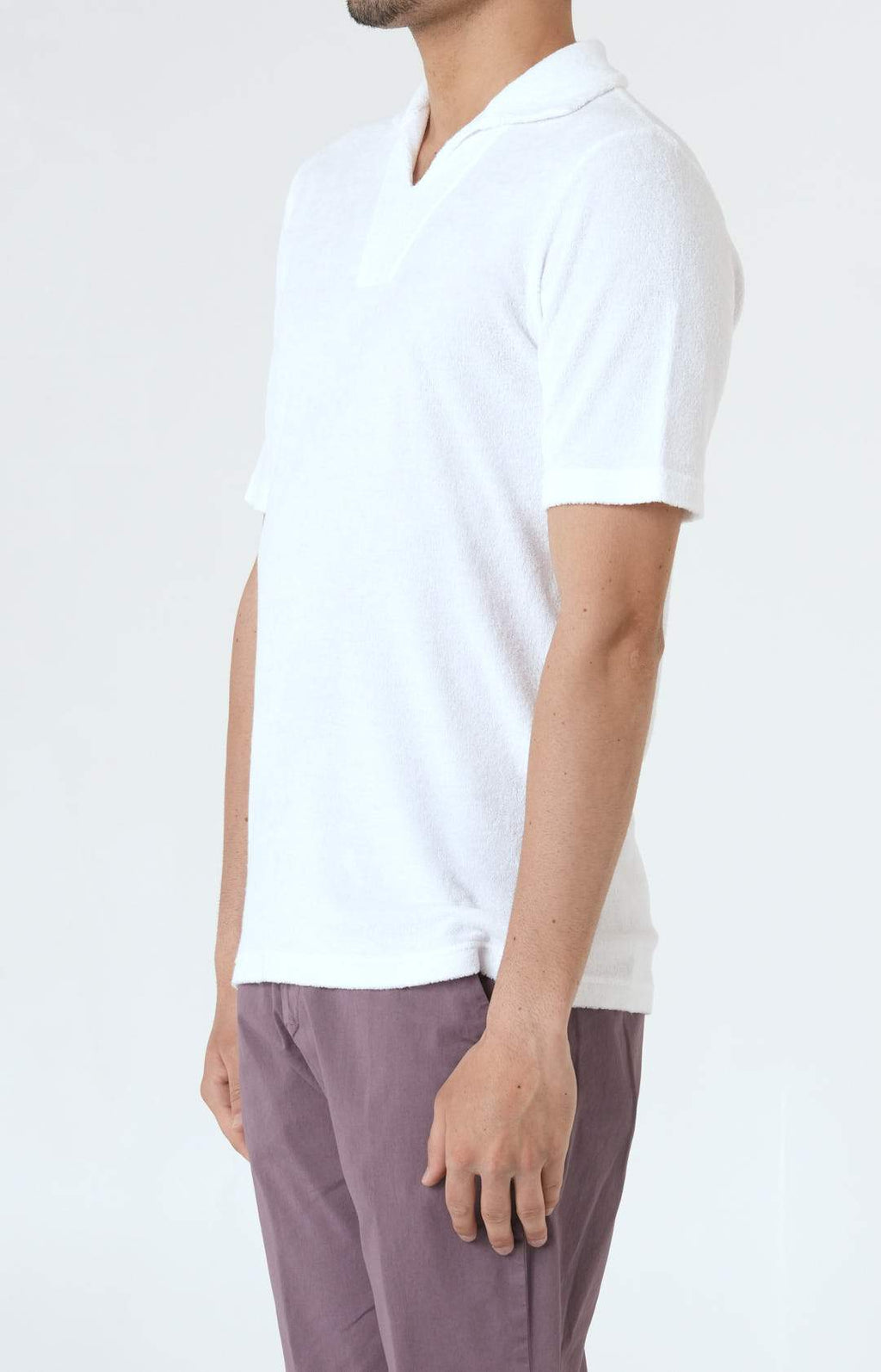 Short-sleeved terry polo shirt with open neck