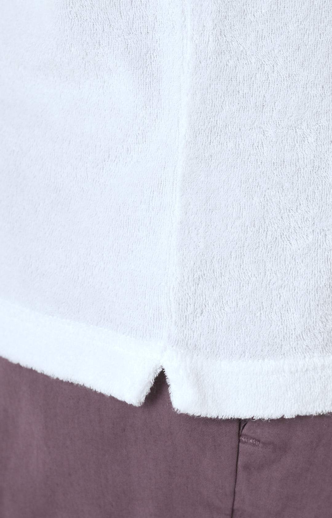 Short-sleeved terry polo shirt with open neck