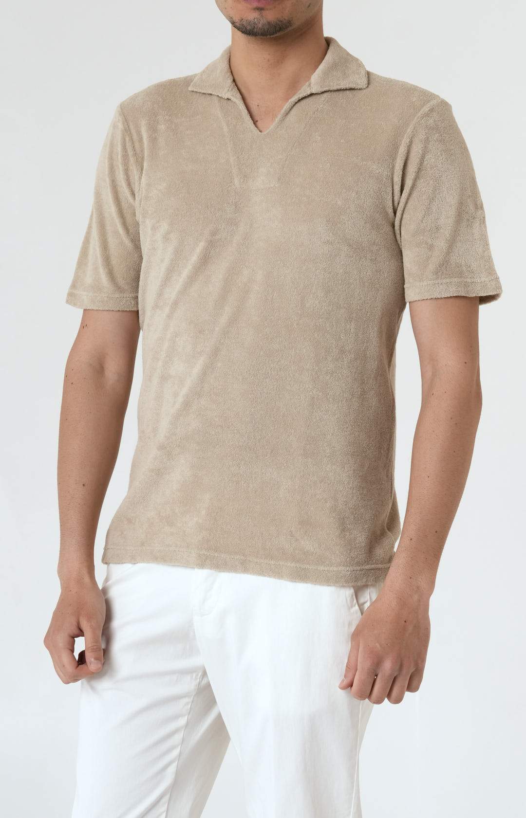 Short-sleeved terry polo shirt with open neck