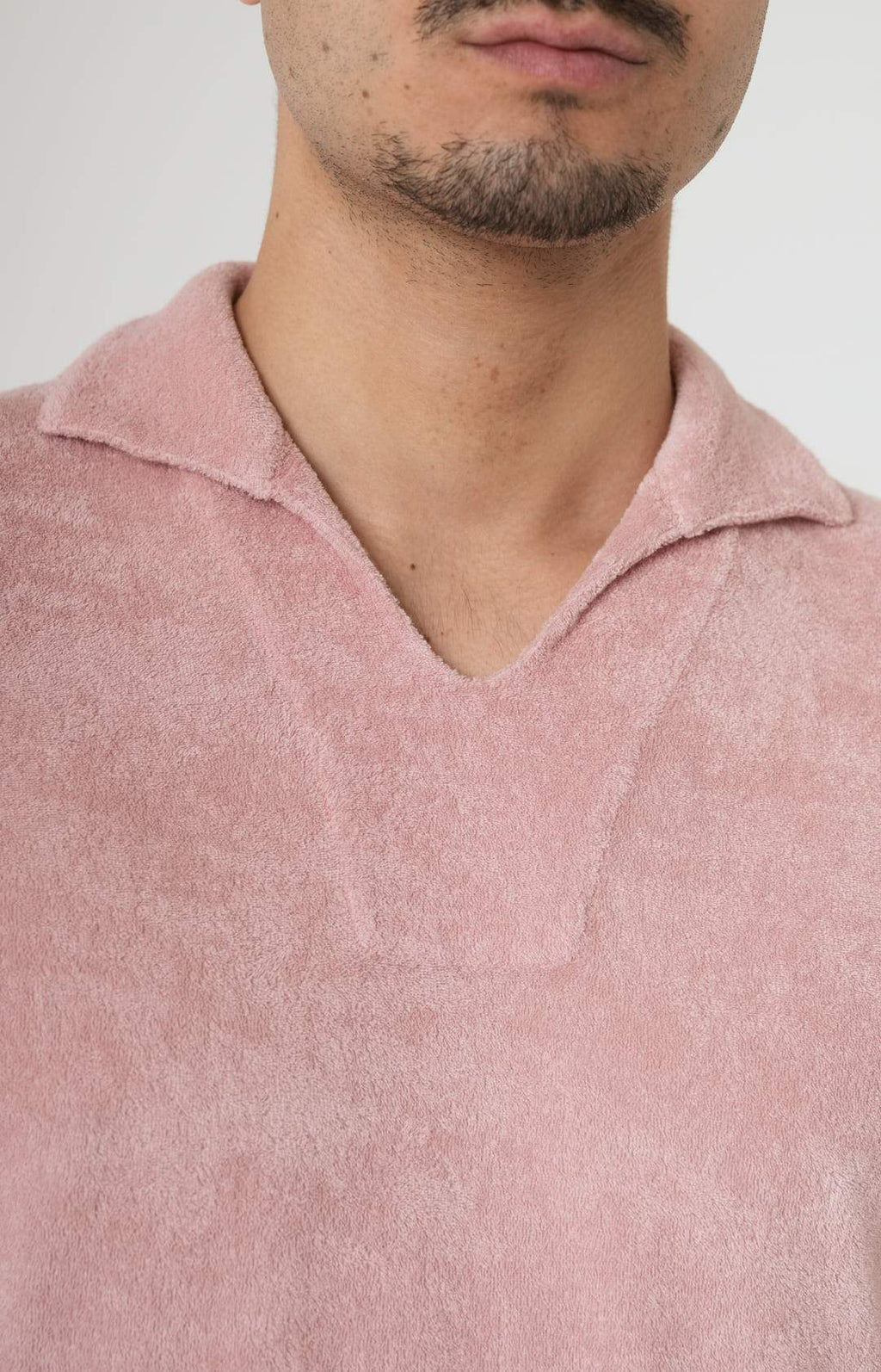 Short-sleeved terry polo shirt with open neck