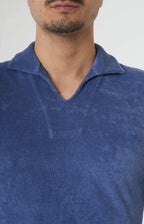 Short-sleeved terry polo shirt with open neck