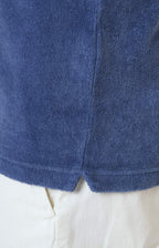 Short-sleeved terry polo shirt with open neck