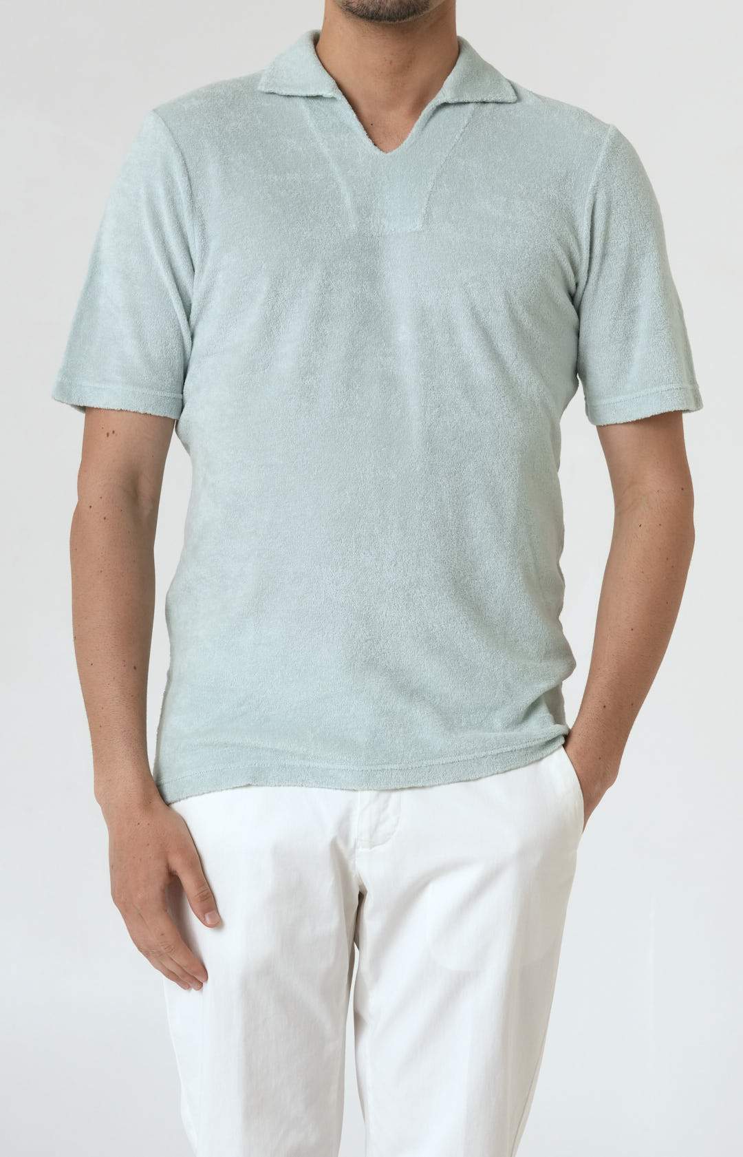 Short-sleeved terry polo shirt with open neck