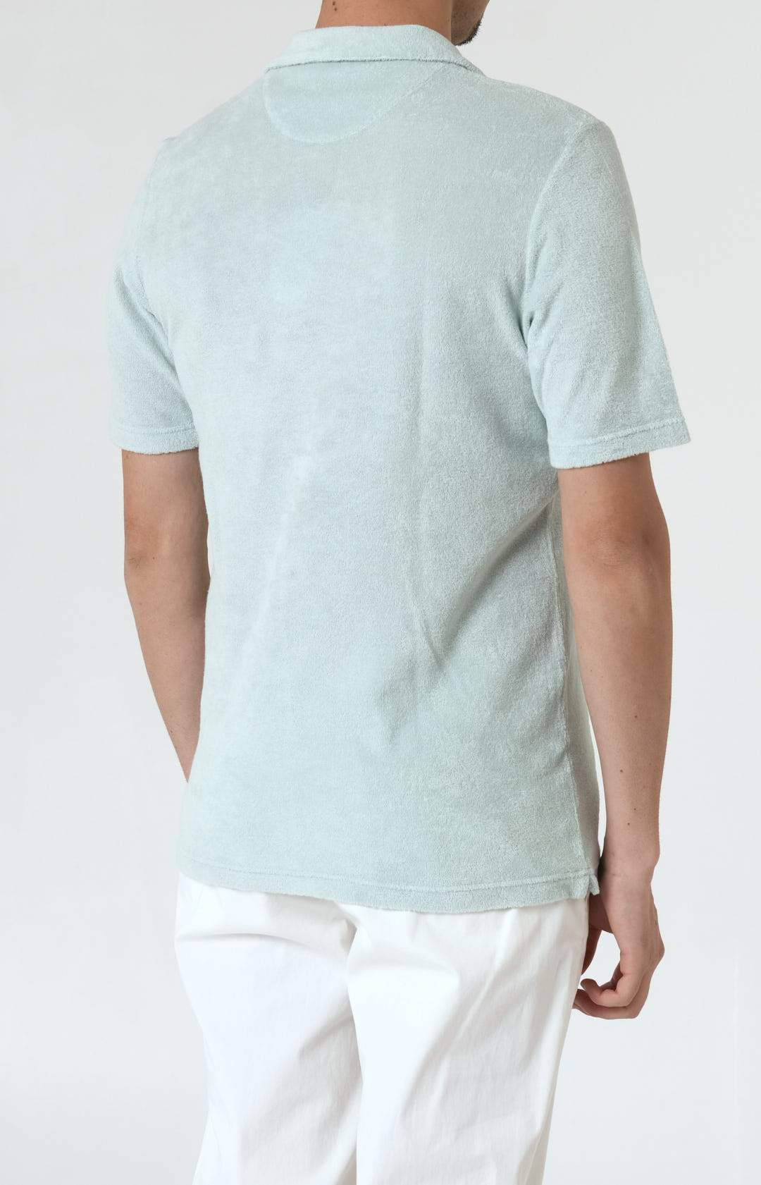 Short-sleeved terry polo shirt with open neck