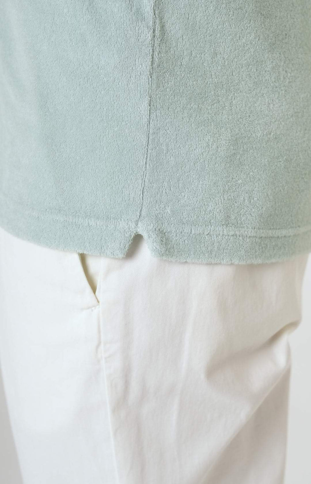 Short-sleeved terry polo shirt with open neck