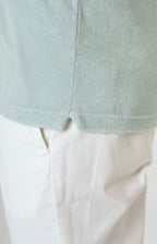 Short-sleeved terry polo shirt with open neck